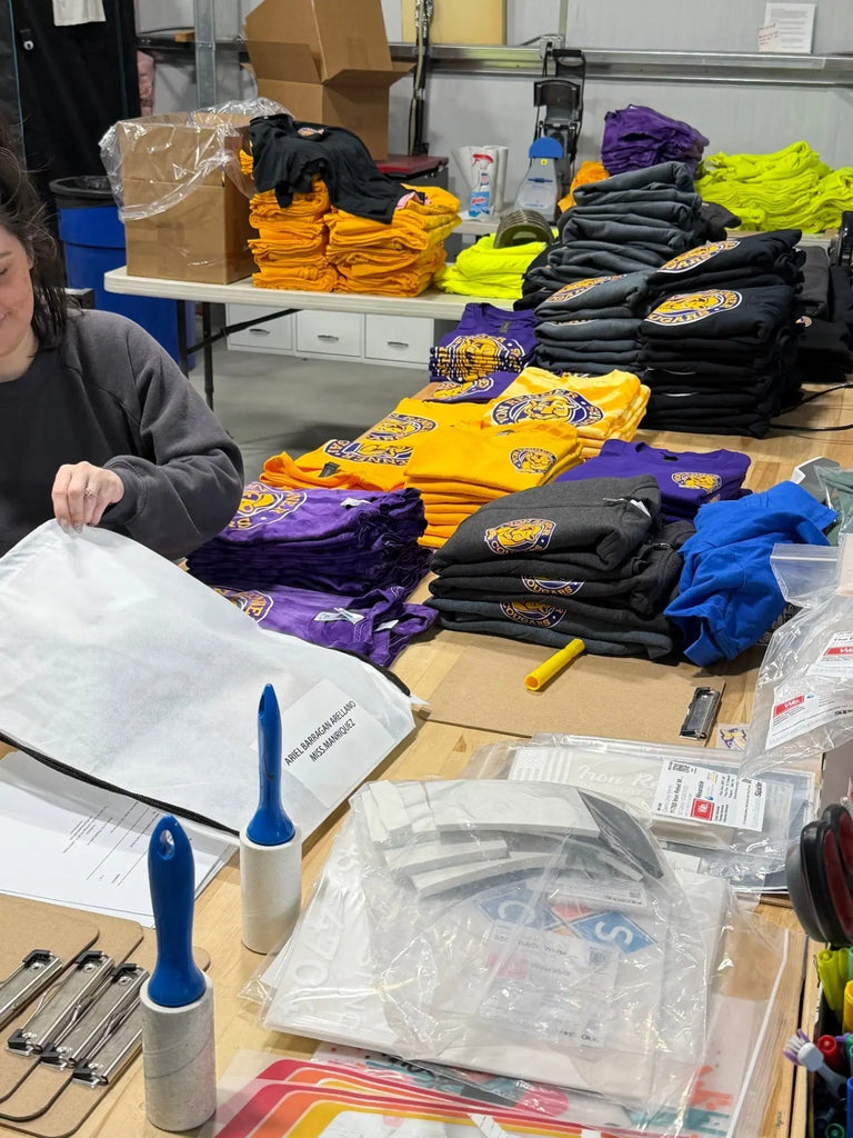Stacks of Custom School Mascot Shirts – Game Over Merch