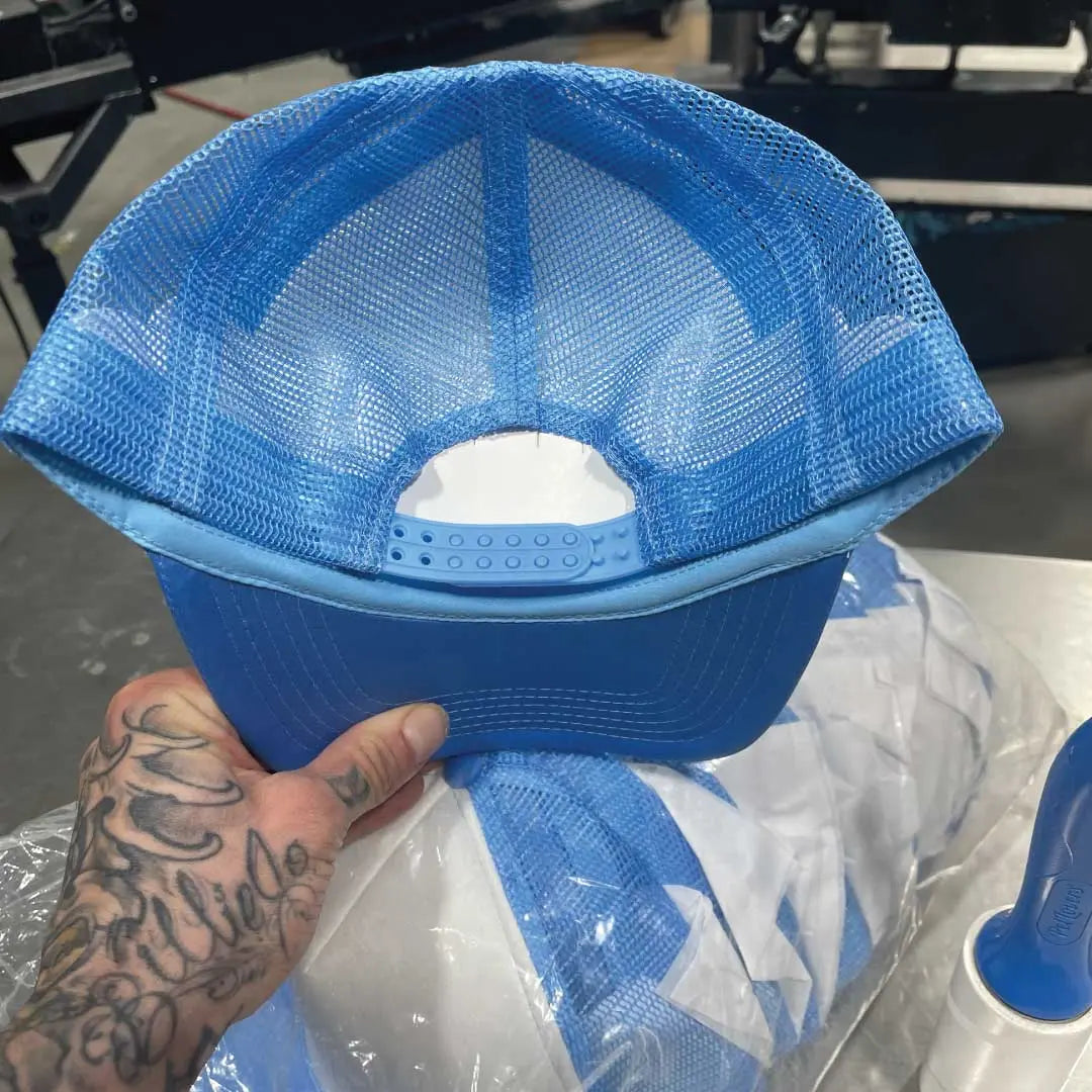14 White/Baby Blue Foam Front Trucker CapsGame Over Merch